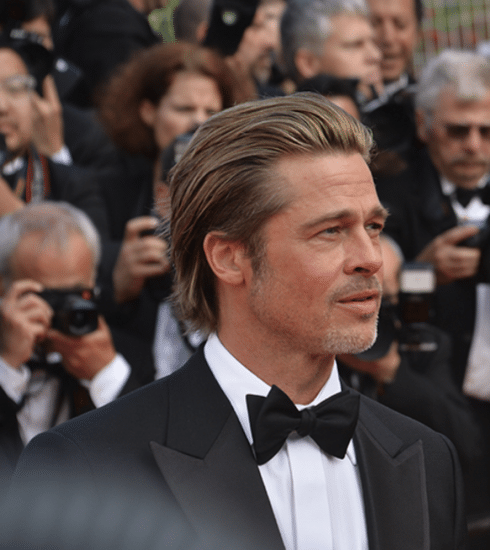 Brad Pitt verschijnt met zijn nieuwe liefde op de Britse Grand Prix